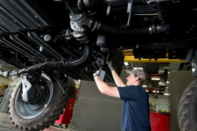 Mechanic Working on Machine