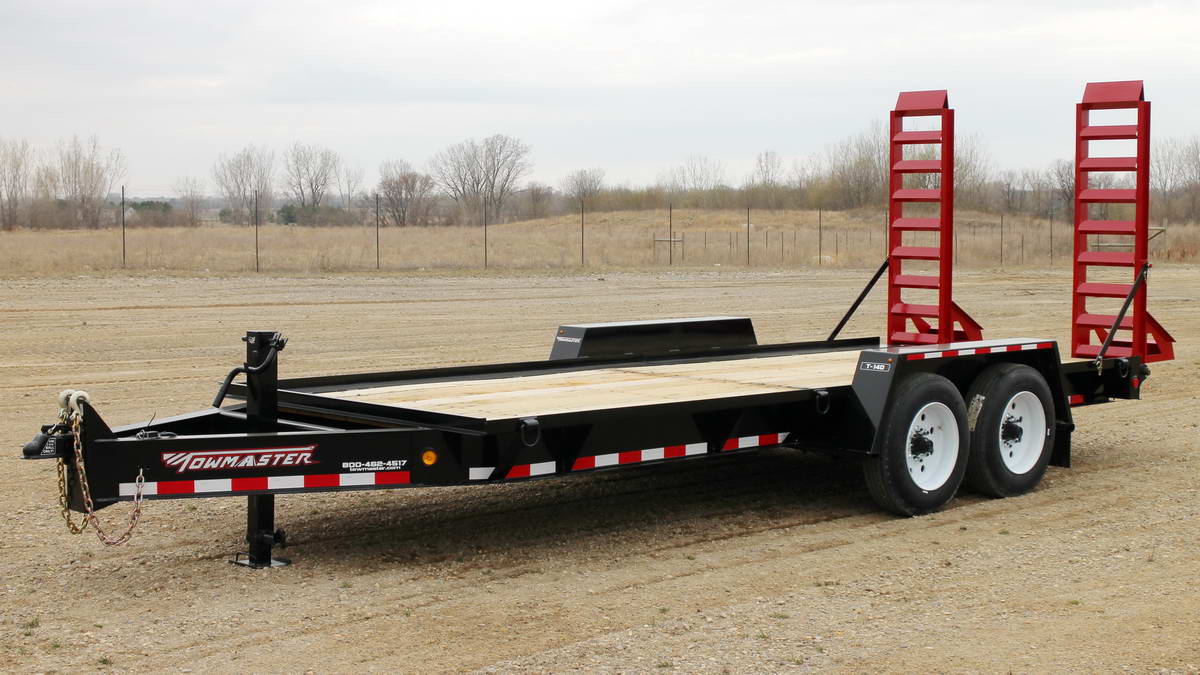 towmaster trailer wit the ramps lifted in the back