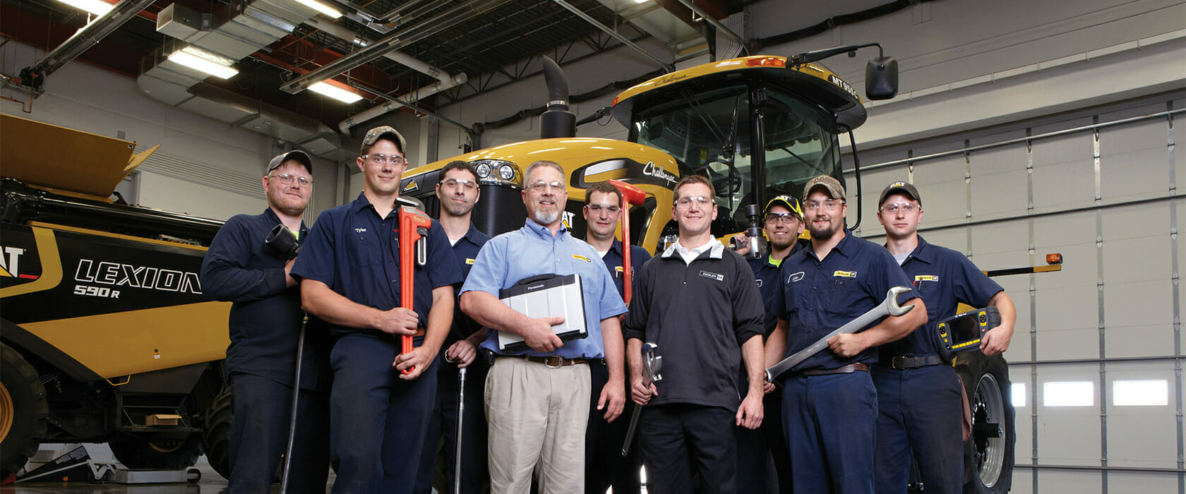 Service techs standing in shop