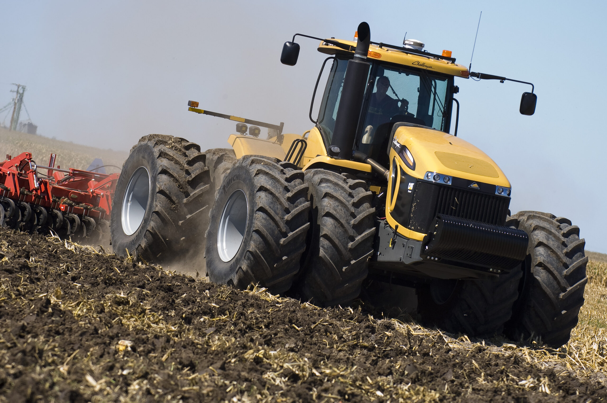 Rental tractor working in farm field