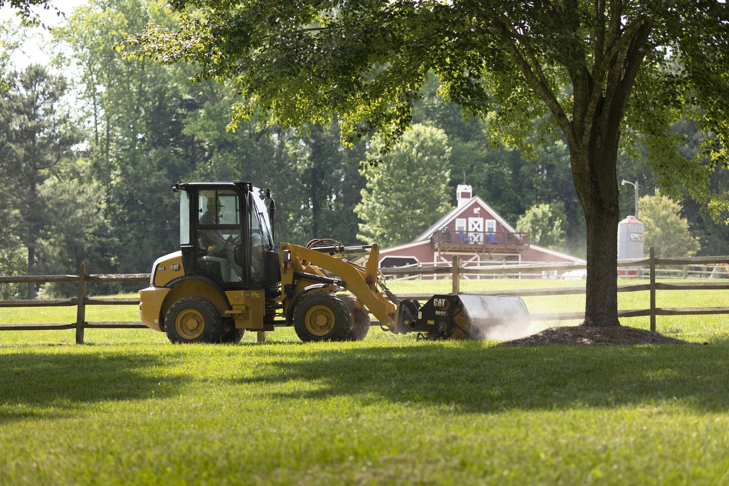Rented landscaping equipment on a hobby farm