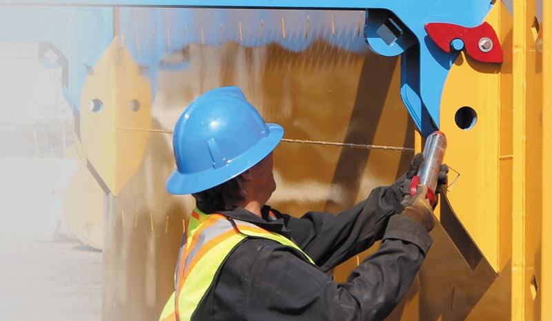 man-assembling-trench-box man assembling trench box