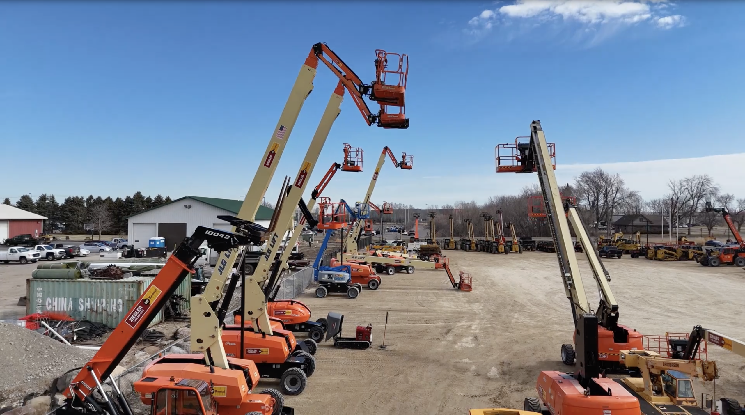 Rented compaction machine in the dirt of a job site