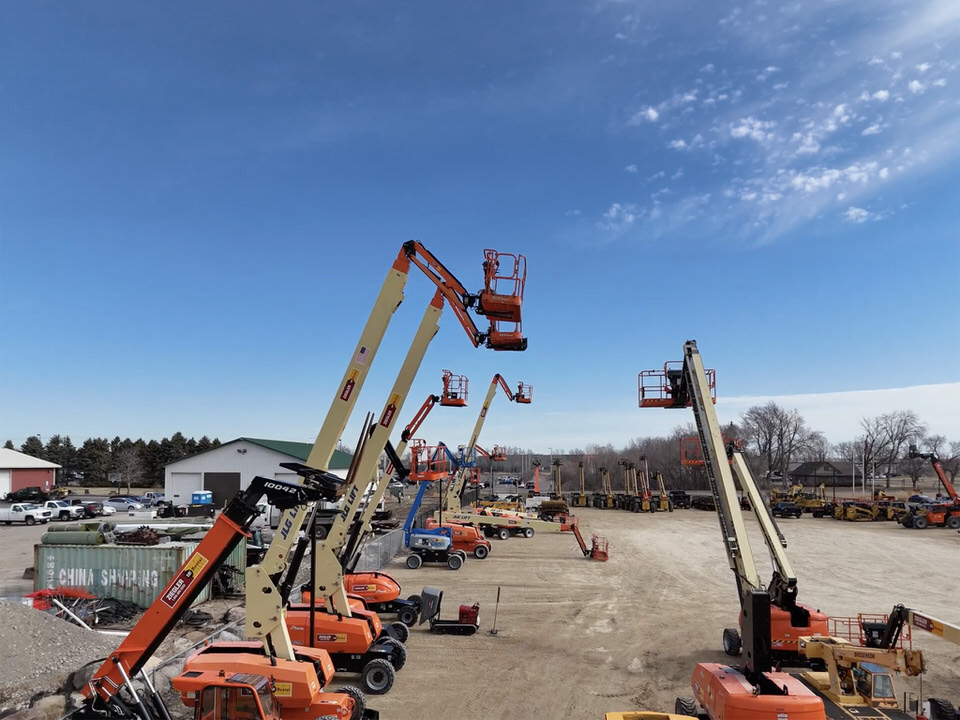 Rented compaction machine in the dirt of a job site